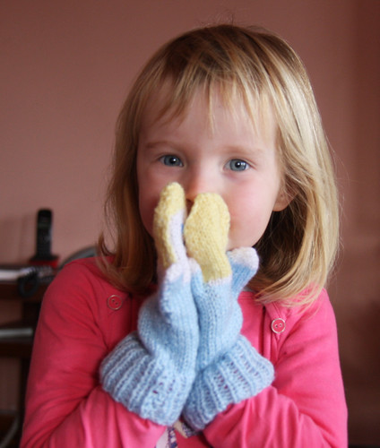 Nora with Mitten Puppets