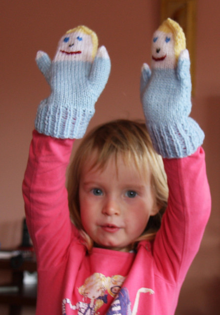 Nora with Mitten Puppets